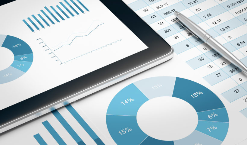 project finance tablet and graphs